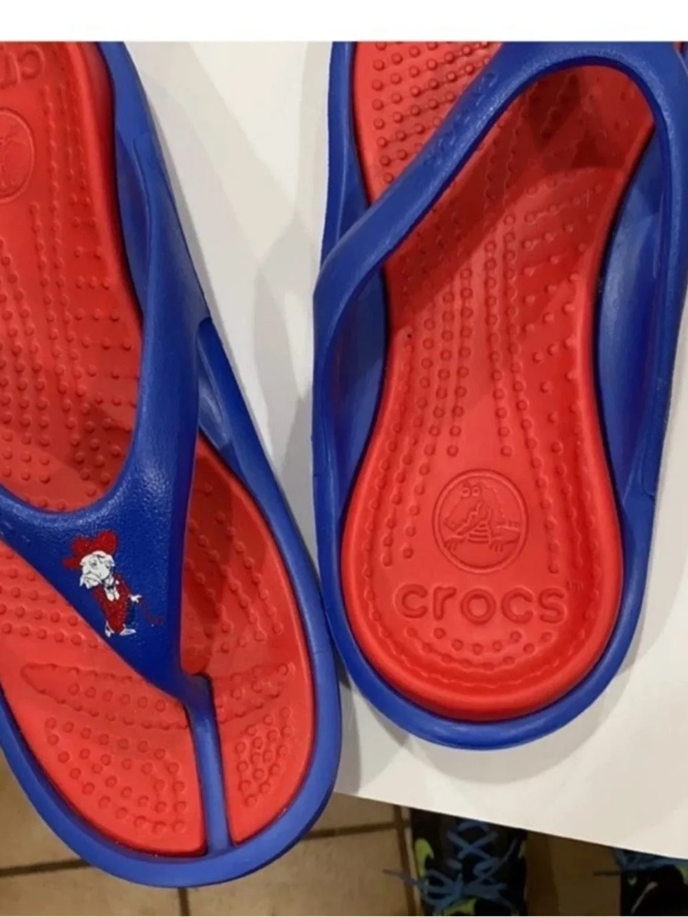 Crocs mens Size 11 Sandal New Blue and Red Flip Sandals, no tags